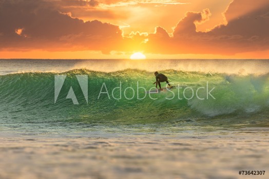 Picture of Surfer Surfing at Sunrise
